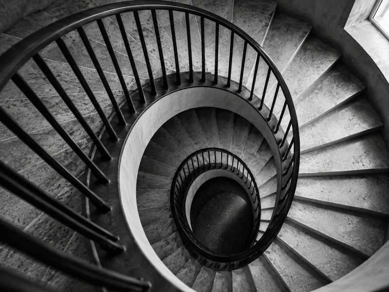A spiral staircase viewed from above.